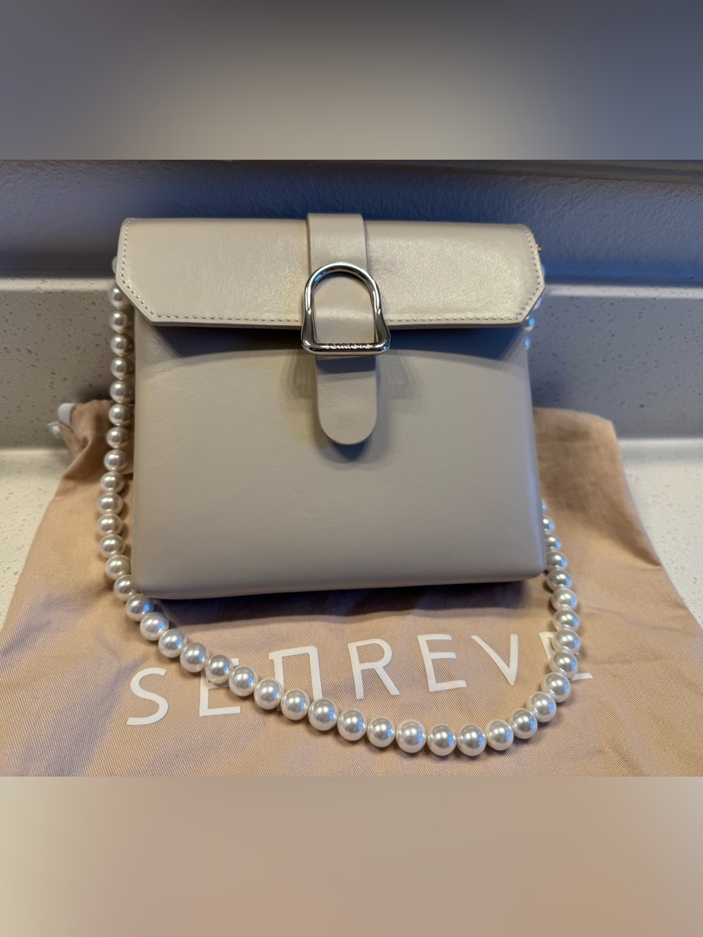 Senreve Cream Pearl-Handle or Leather Strap Top Handle Bag with Silver Buckle